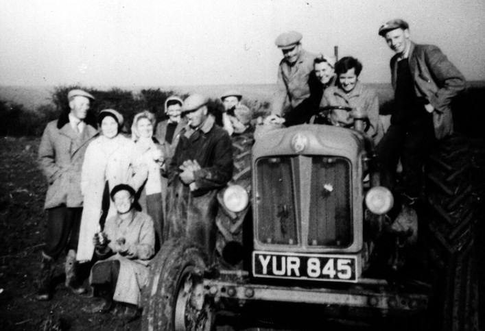 Late 1950s Tractors like this Fordson Major were started on petrol, but run on paraffin. L-R: Stan Walker, Nellie Walker, ?,Patty Pickering, Phil Walker, Minnie Males in front, Ken Walker,?, Johnny Kingsley, Betty Titmus, Ann Bennet and Alan Walker. Tractors shortened the working day â it was no longer necessary to walk the horses through the village pond to clean them, and more importantly to wet the cart wheels to stop them shrinking and shedding their iron rims.