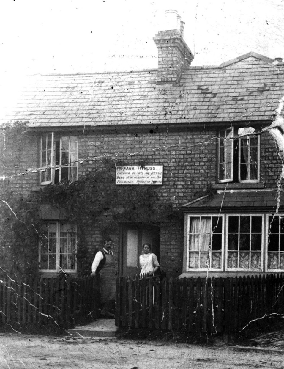Fred and Ruth Titmuss outside the Blacksmiths Arms opposite the pond